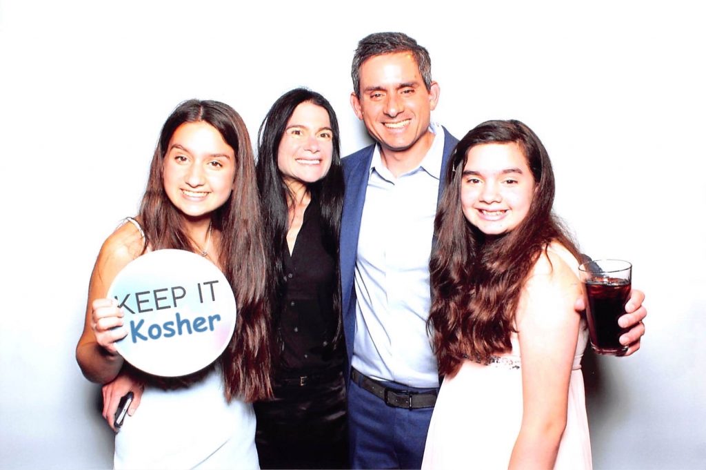 Brian with his wife and two daughters