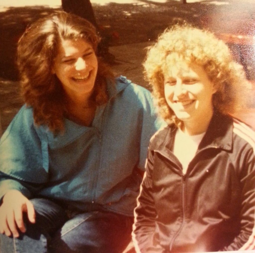 Sarah outside the pool with friend Cathy Milch