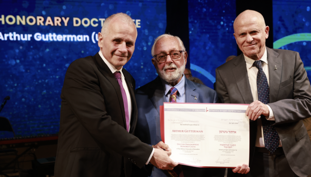 The Hebrew University of Jerusalem President Professor Asher Cohen (left) presented humanitarian, philanthropist, and businessman Arthur Gutterman with a prestigious Honorary Doctorate degree during the 86th Board of Governors Meeting on June 12, 2023, in Jerusalem. Professor Tamir Sheafer, Hebrew University Rector, is on his right. Credit: Yossi Zamir.