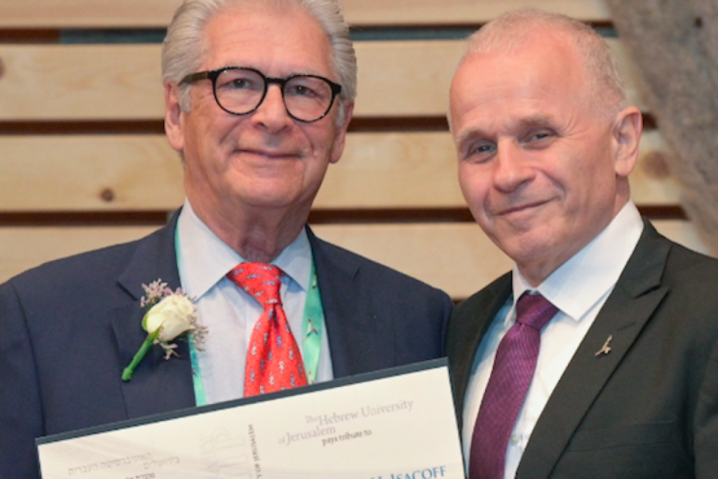 The Hebrew University of Jerusalem President Professor Asher Cohen (right) presents an Honorary Fellowship to Dr. William Isacoff on June 12, 2023, at the 86th Board of Governors Meeting in Jerusalem. Credit: Bruno Charbit.