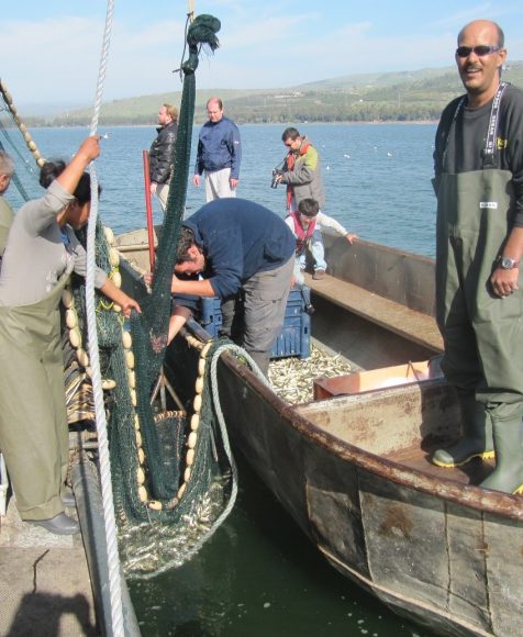The late Tomer Borovsky (right) with the fishing team from Kibbutz Ein Gav aboard Captain Menachem Lev's boat 'Gil'.